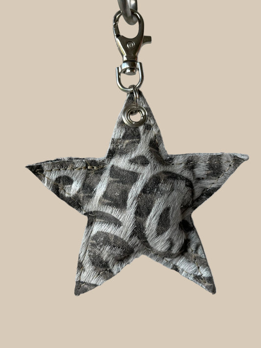 Silver Giraffe Hair on Hide Star Keyring